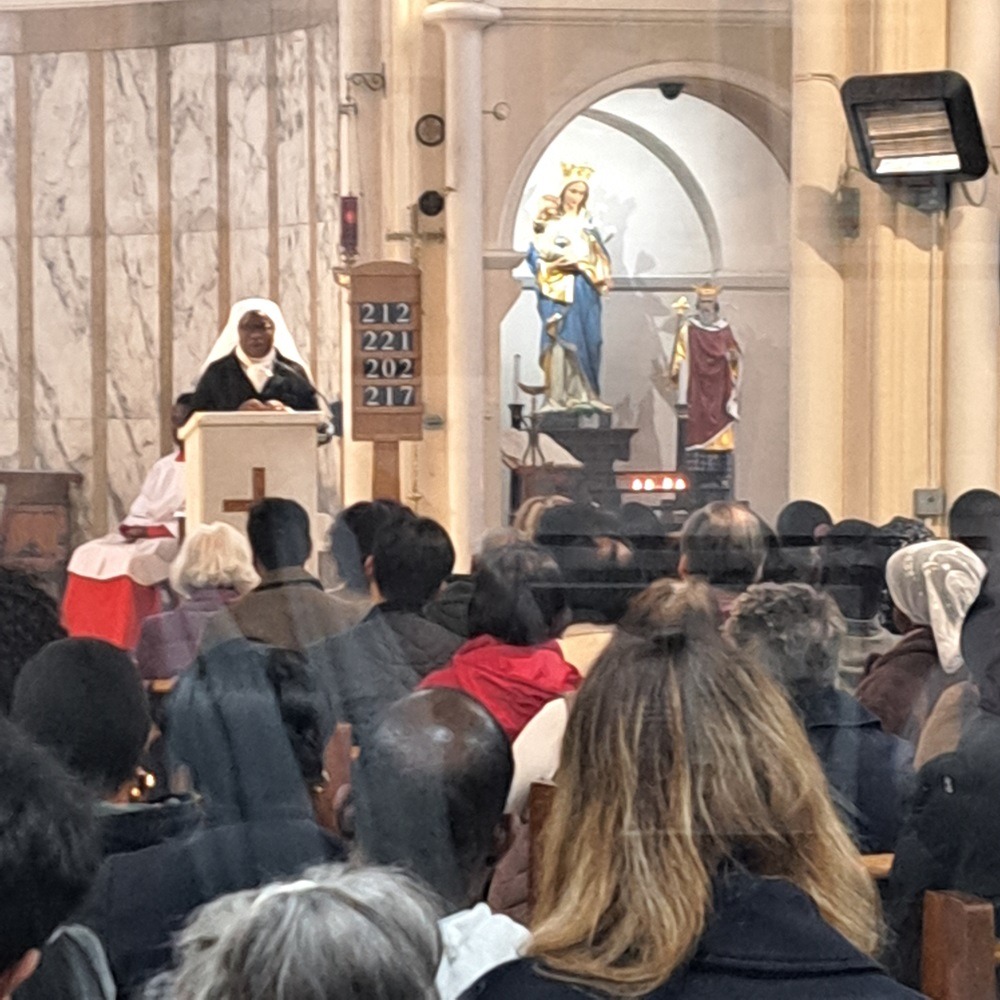 Sister speaking during a church propagation event