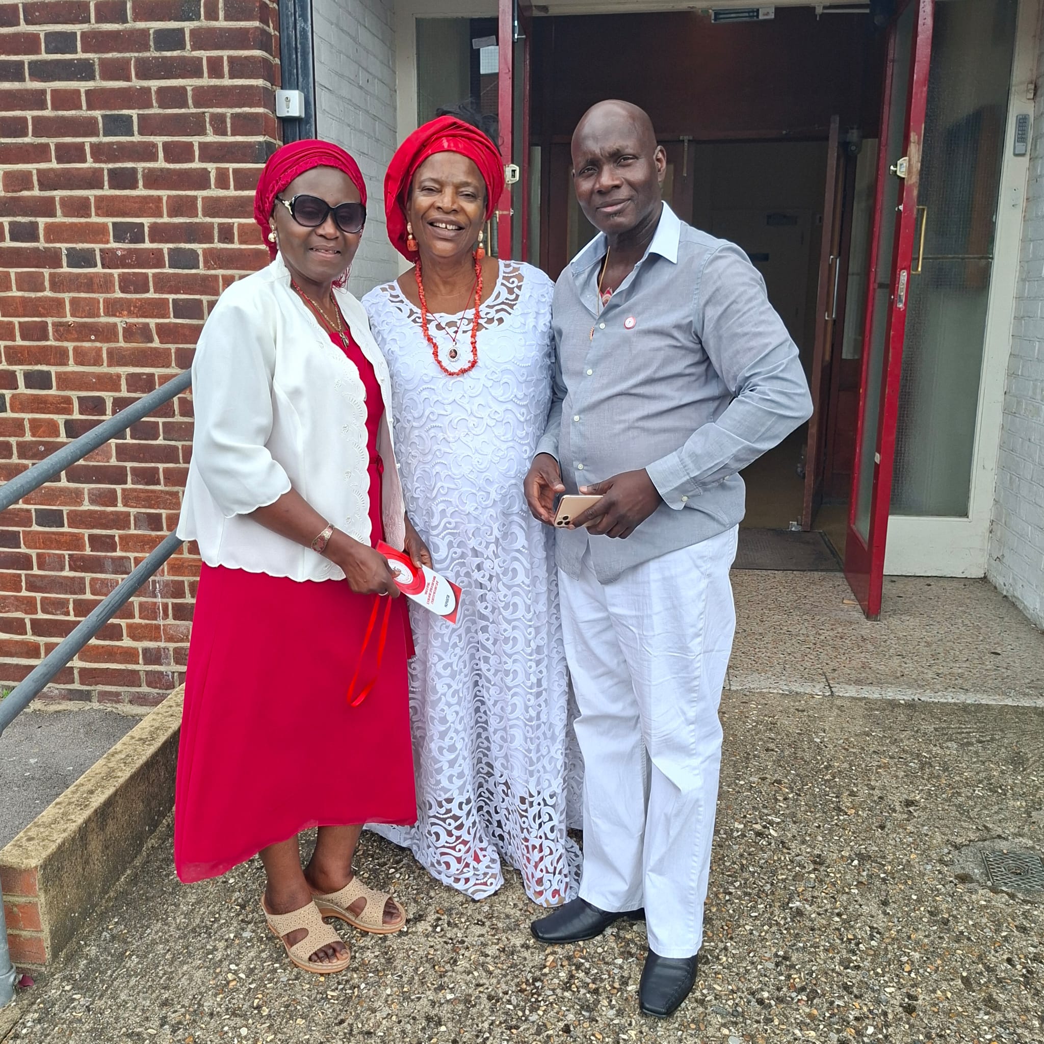 Devotees outside Our Lady of the Rosary and St Patrick's Walthamstow London