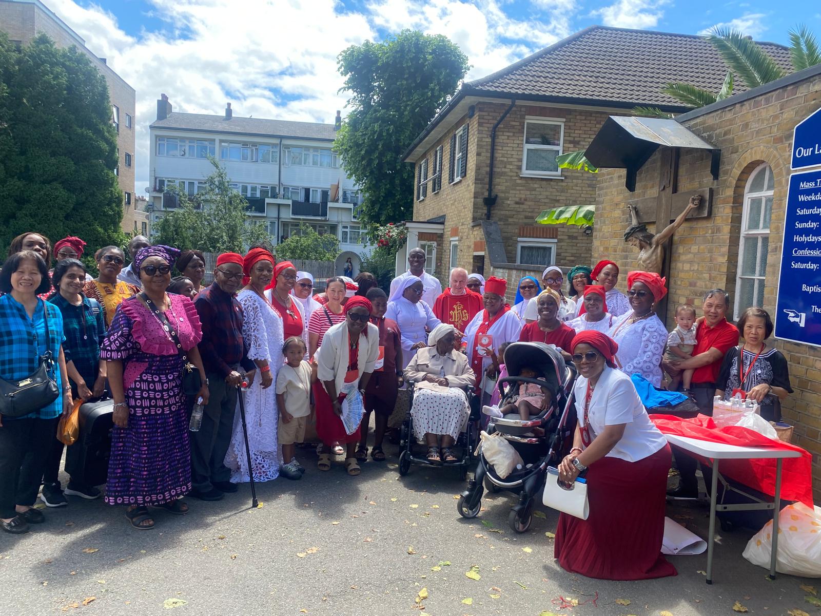Devotees gathered outside Our Lady of the Rosary and St Patrick's Walthamstow London
